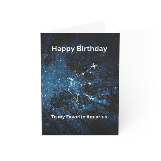 Portrait-oriented birthday card featuring a night sky background filled with twinkling stars, resembling a view through dark trees. The top half of the card reads 'happy birthday' in white, while the bottom half states 'To my favorite Aquarius' also in white. In the foreground, the white Aquarius constellation stands out as the central image.